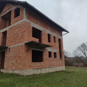 Huge house, quality brickwork, surrounded by meadows 